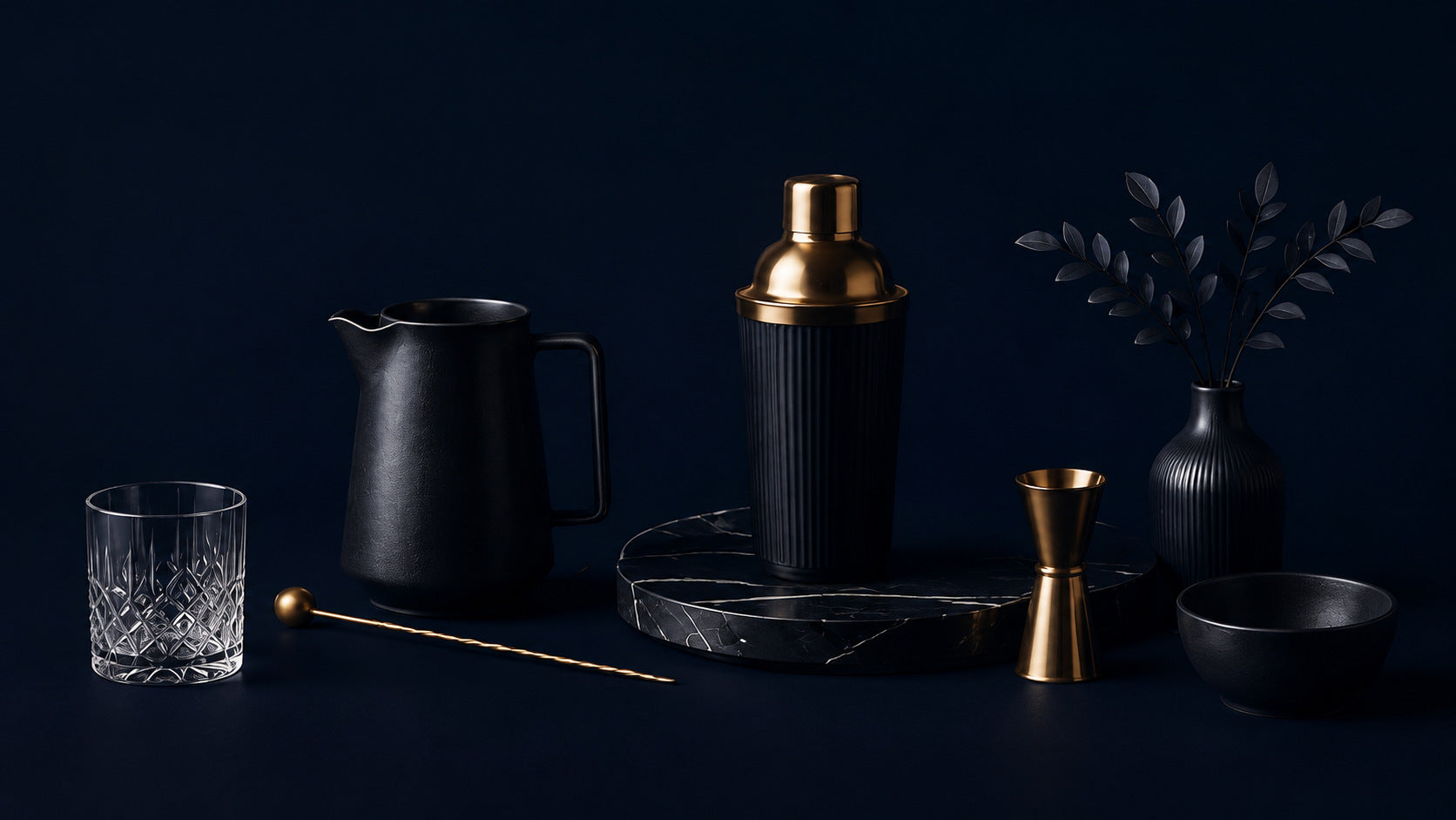 Midnight navy barware collection with black stone and gold details